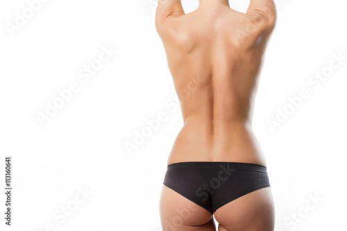 Beautiful female back on a white background