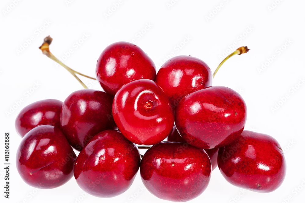 heap fruits of red cherry isolated on white background heap fruits of red cherry isolated on white background