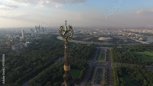 Helicopter flight over MSU Moscow State University. Close approach to star. Moscow city center and Luzhniki stadium at background. Ultra HD 4K. Best footage.