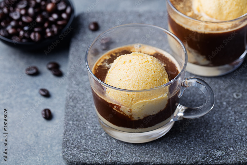 Affogato coffee with ice cream on a glass cup Grey slate background Affogato coffee with ice cream on a glass cup Grey slate background