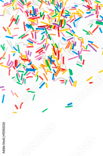 Colorful candy sprinkles isolated on white background card