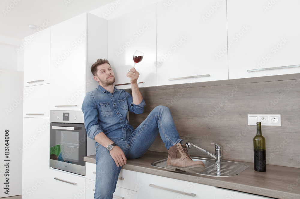 Young man with wine. Young man with wine.