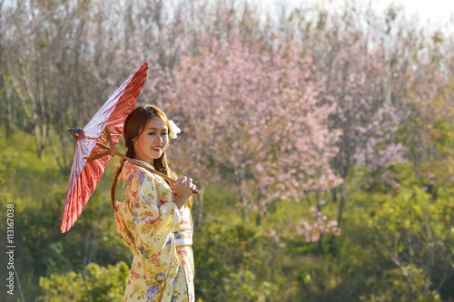 Asian woman wearing traditional japanese kimono © saravut