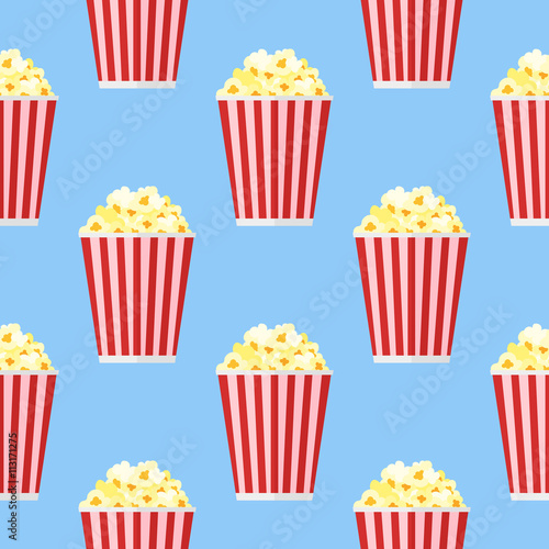 Seamless pattern with popcorn on blue background. Vector texture.