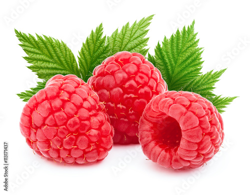 Three ripe raspberries with green leaf isolated on white background with clipping path