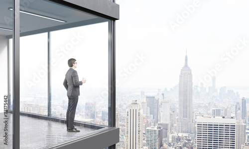 Businessman on balcony