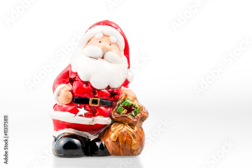 ceramic candle holder in the form of Santa Claus isolated and a photo