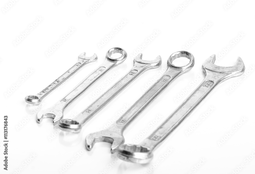5 Wrench of different sizes aligned from smallest to biggest iso 5 Wrench of different sizes aligned from smallest to biggest iso