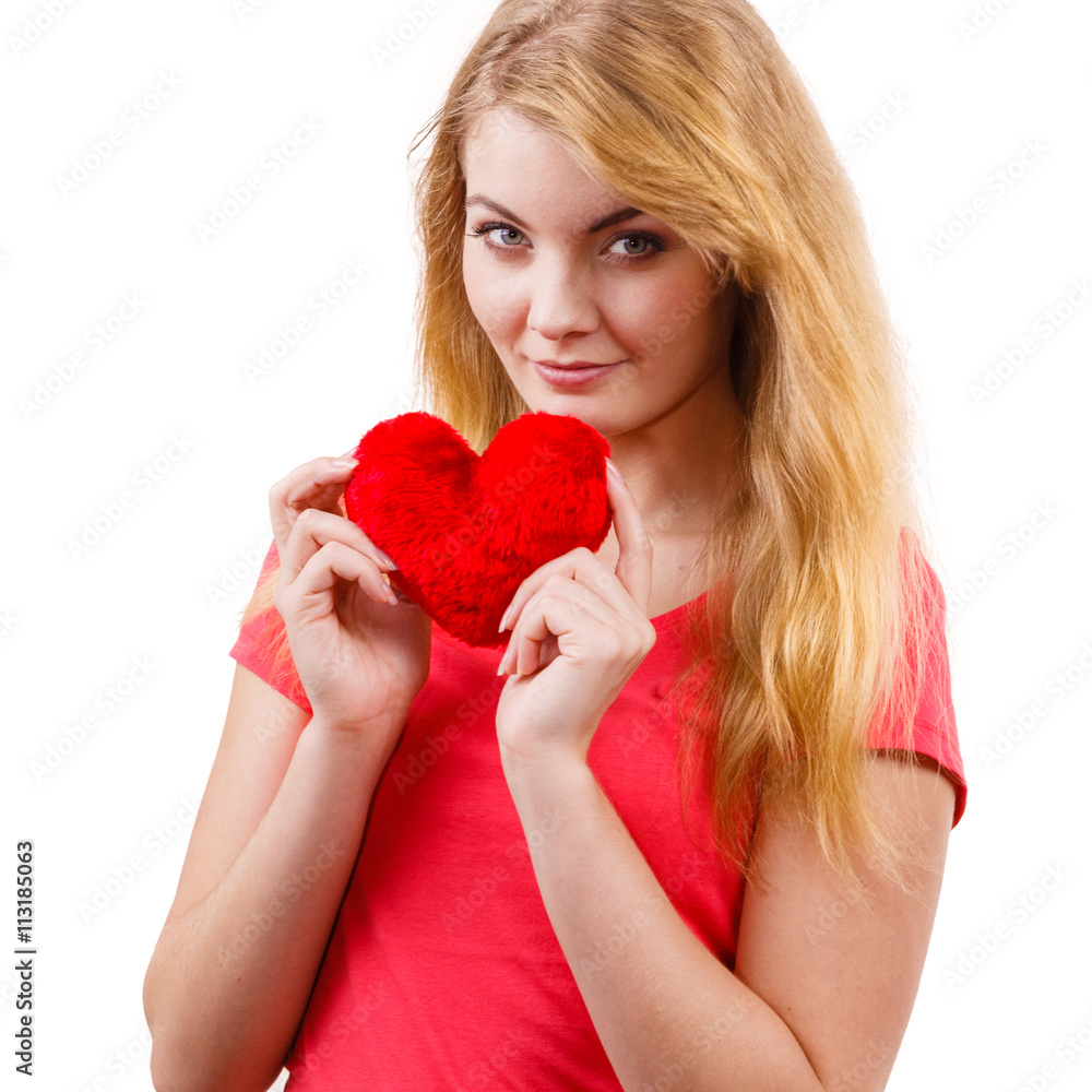Woman blonde girl holding red heart love symbol Woman blonde girl holding red heart love symbol