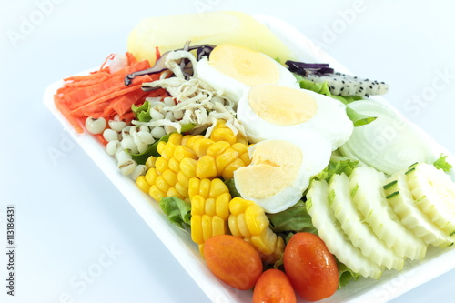 Mixed vegetable salad with chicken meat and eggs