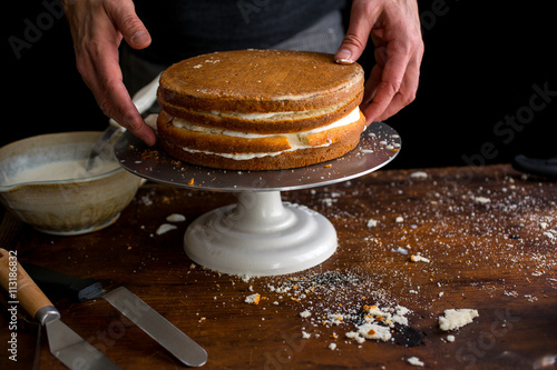 Making cardamom cream cake photo