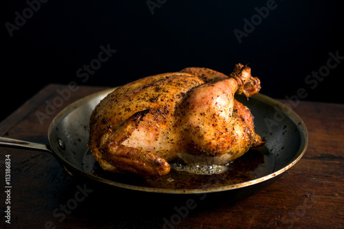 Feta brined chicken on frying pan