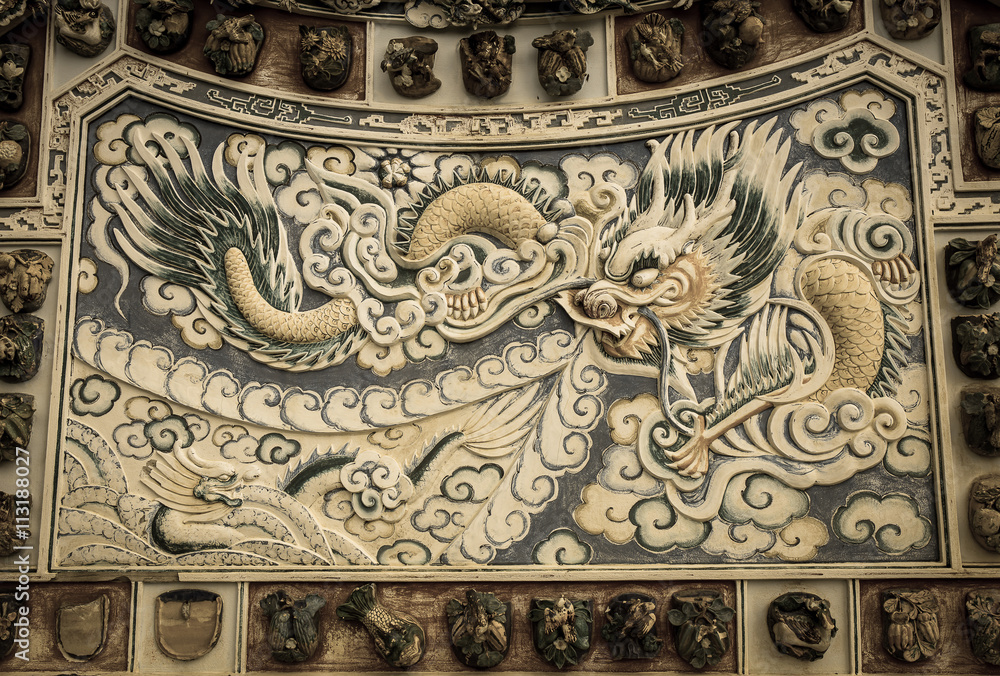 Dragon stucco on wall in chinese temple