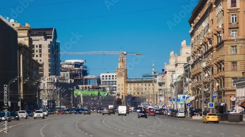 Wallpaper Mural Busy sunny city traffic time lapse with distant crane. Moscow Sadovoe ring Torontodigital.ca