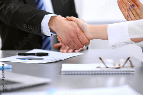 Business people shaking hands, finishing up a meeting