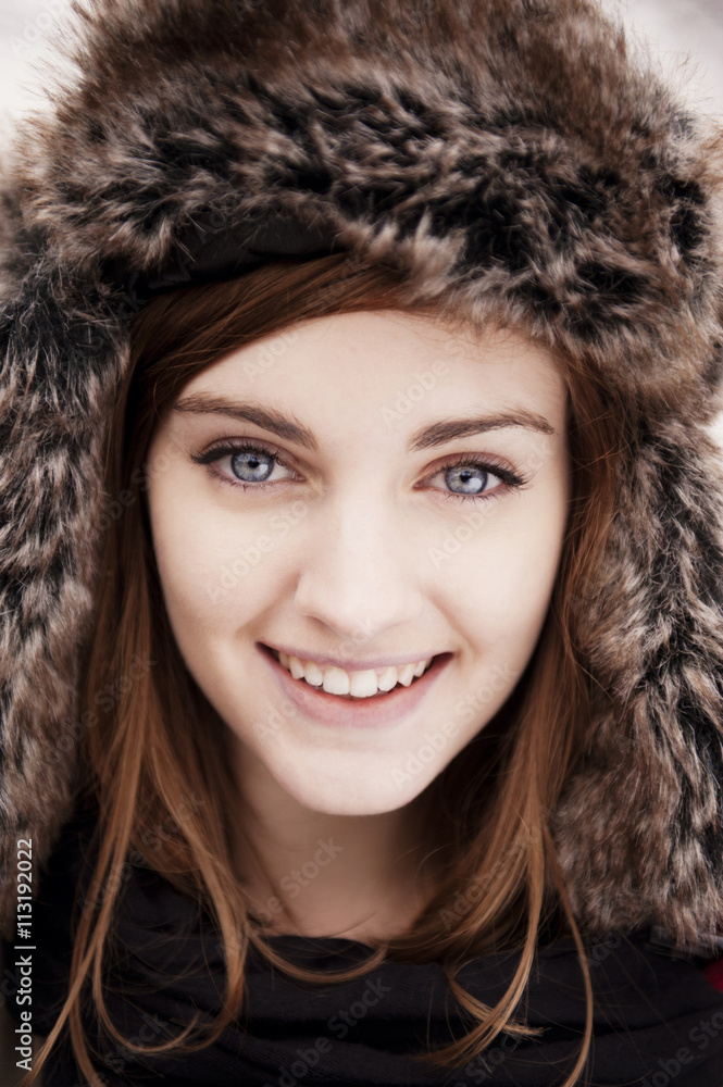 Portrait of smiling woman in fur hat Portrait of smiling woman in fur hat