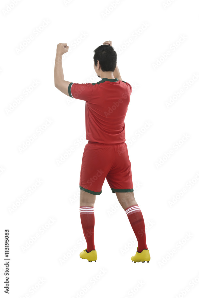 Winning football player after scoring Winning football player after scoring