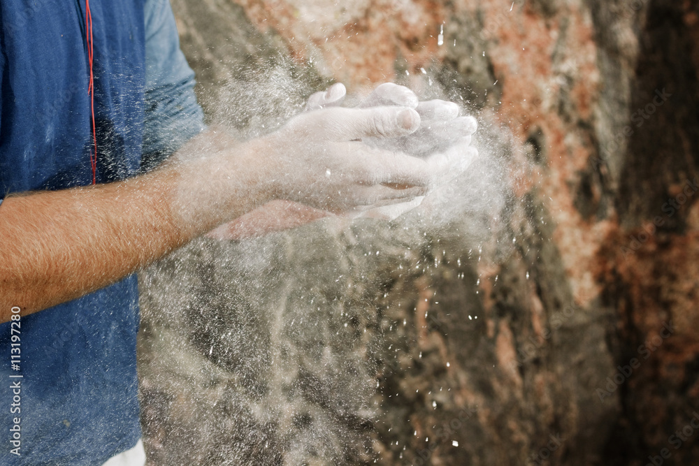Climber Clapping Hands With Chalk Climber Clapping Hands With Chalk