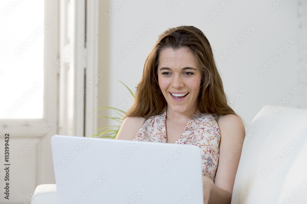 young beautiful woman working with laptop computer smiling happy or doing online internet shopping young beautiful woman working with laptop computer smiling happy or doing online internet shopping
