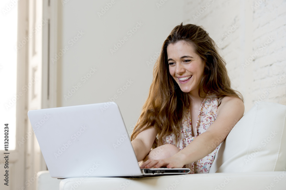 young beautiful woman working with laptop computer smiling happy or doing online internet shopping young beautiful woman working with laptop computer smiling happy or doing online internet shopping