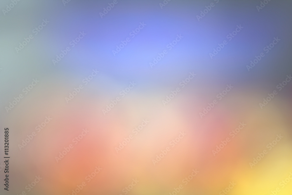 Colored Background from spots of blurred flowers of tulips
