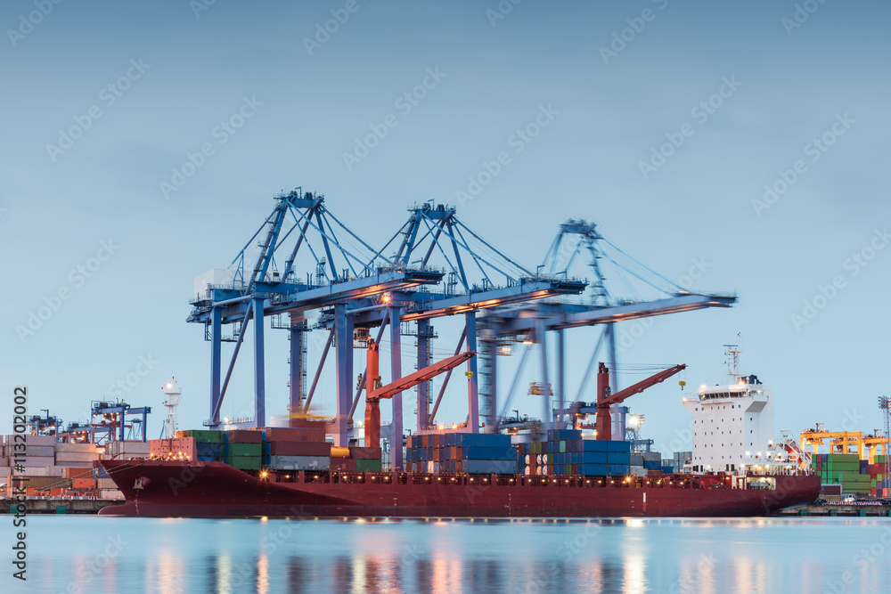Container Cargo freight ship by crane bridge