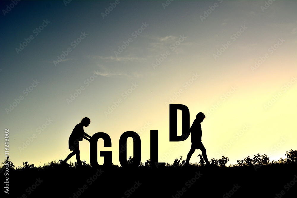 Silhouette people and gold word at sky sunset Silhouette people and gold word at sky sunset