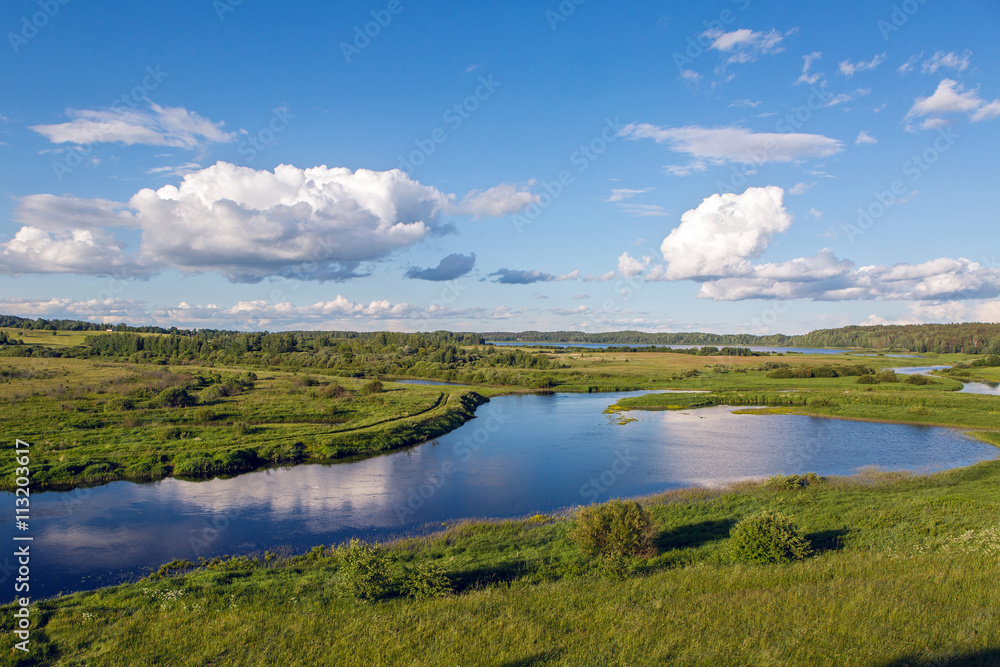 beautiful day landscape with a lake