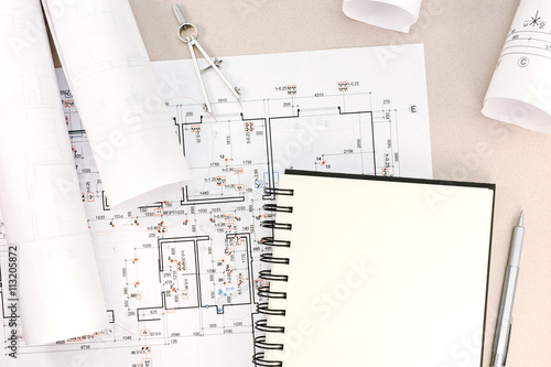architectural background with technical drawings and work tools
