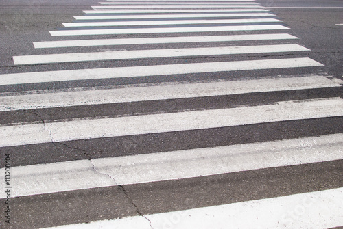 Pedestrian crossing on the road in the form of a zebra
