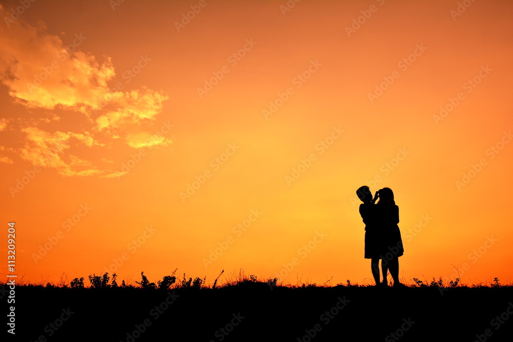 Silhouette children at sky sunset Silhouette children at sky sunset