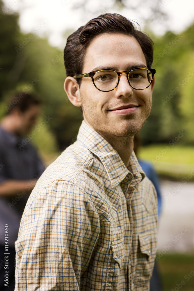 Portrait of smiling man standing outdoors Portrait of smiling man standing outdoors