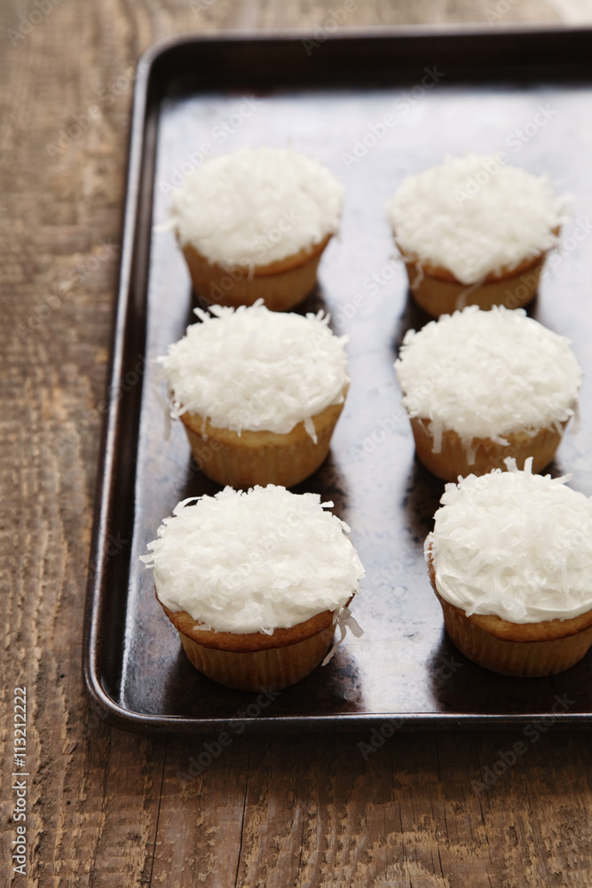 High angle view of cupcakes in tray on table High angle view of cupcakes in tray on table