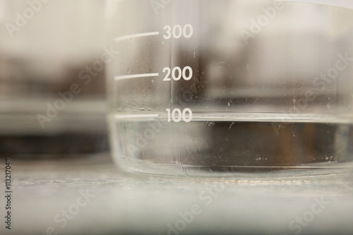 Close-up of measuring beaker photo