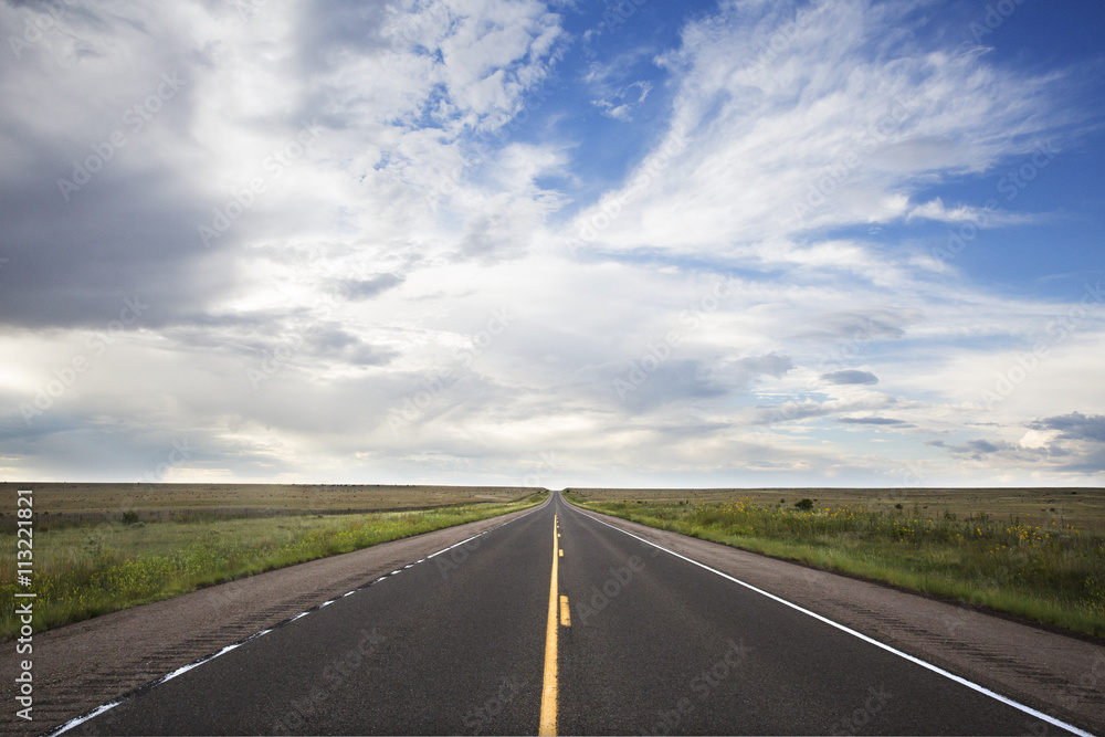 View of empty road against cloudy sky View of empty road against cloudy sky