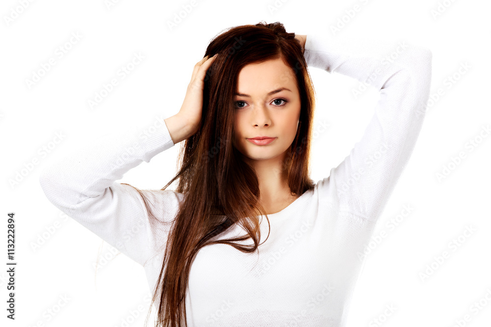 Young beautiful woman massaging her own hairs Young beautiful woman massaging her own hairs