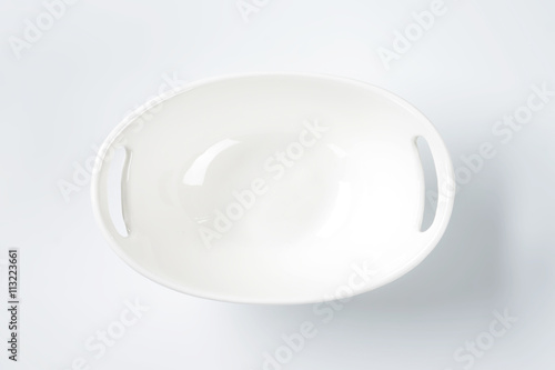 white oval bowl with handles