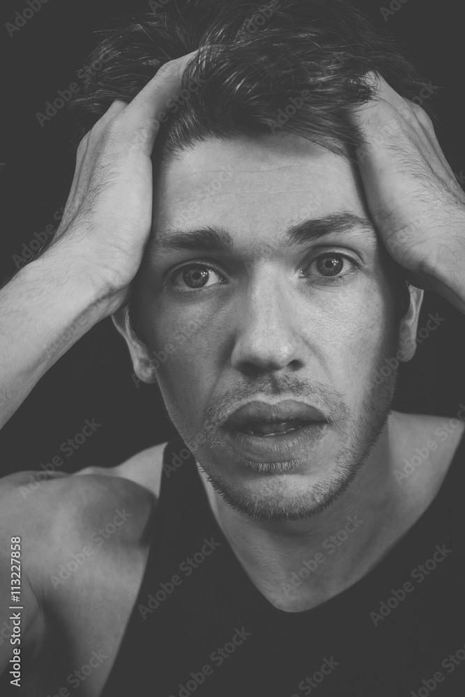Headshot of a worried man Headshot of a worried man