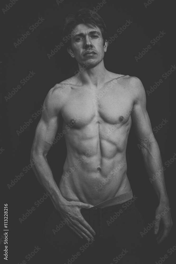 Portrait of a Muscular man in a studio Portrait of a Muscular man in a studio