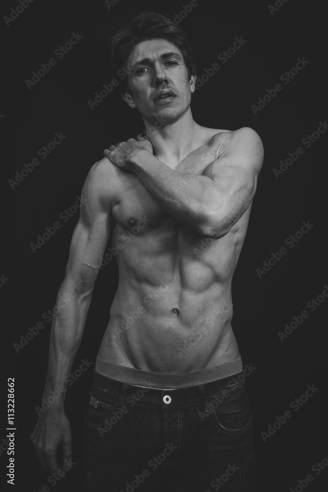 Portrait of a Muscular man in a studio Portrait of a Muscular man in a studio