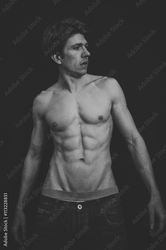 Portrait of a Muscular man in a studio Portrait of a Muscular man in a studio