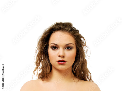 Beautiful topless woman with long curly hair