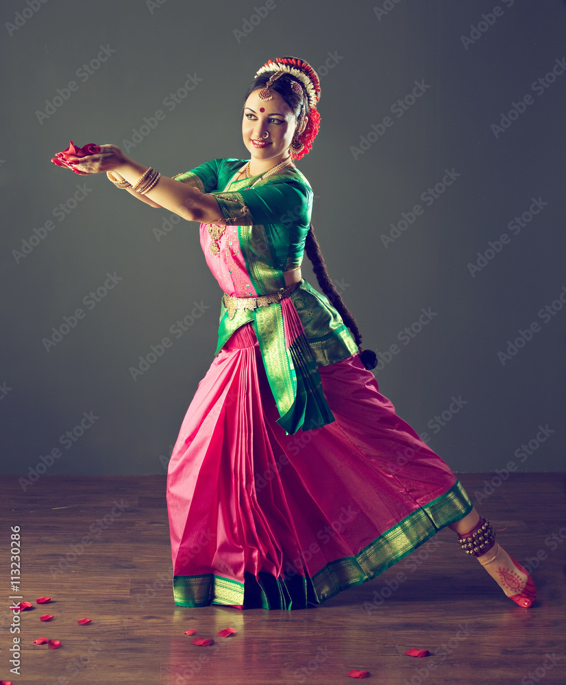 Naklejka premium Beautiful indian girl dancer of Indian classical dance Bharatanatyam or Kuchipudi