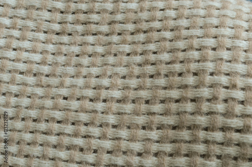 Handmade wool blanket as background.