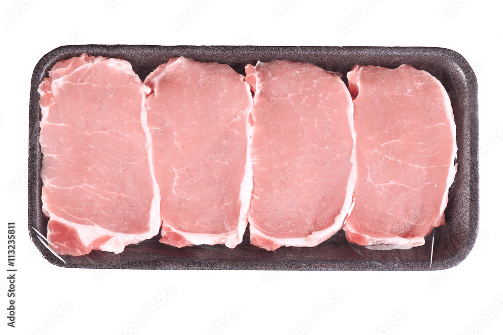 Packed pieces of pork meat, isolated on white Packed pieces of pork meat, isolated on white