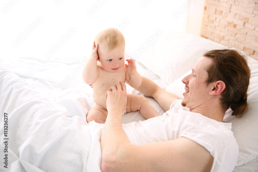Young father having fun with his little son Young father having fun with his little son