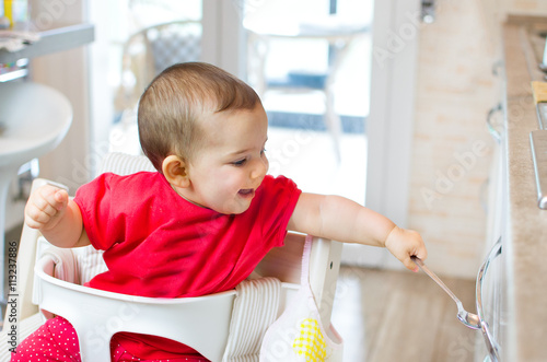 newborn high chair play beating kitchen drawer spoon - heuristic photo