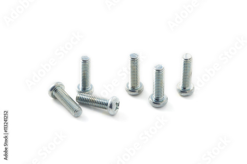 Closeup dirty silver screws isolated