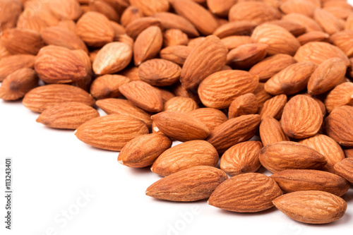 peeled almonds isolated on a white background 