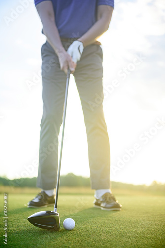 Man playing game of golf